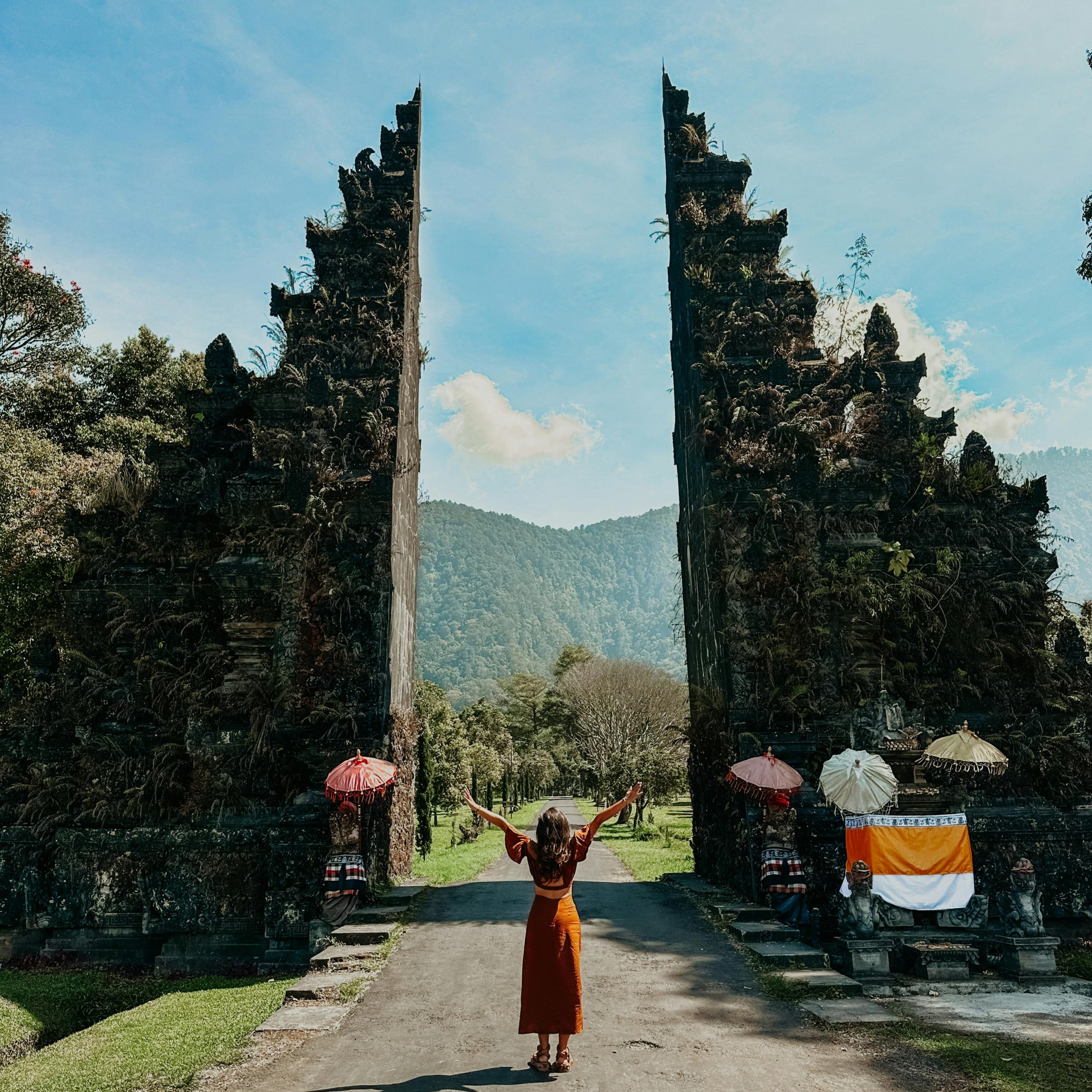 The grand entrance to the Temple of the Sun, showcasing intricate carvings and majestic architecture under a clear sky.