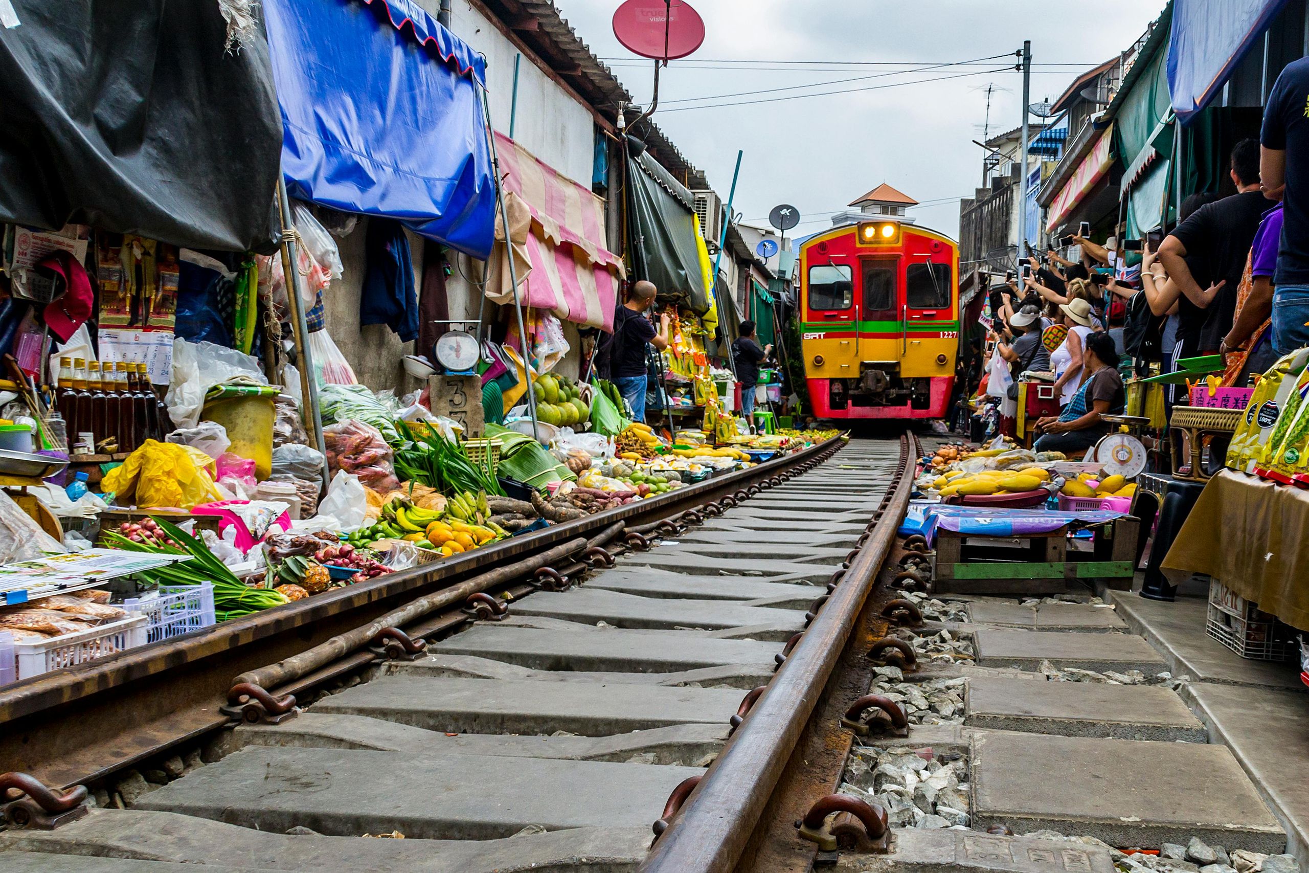 a train going through a market