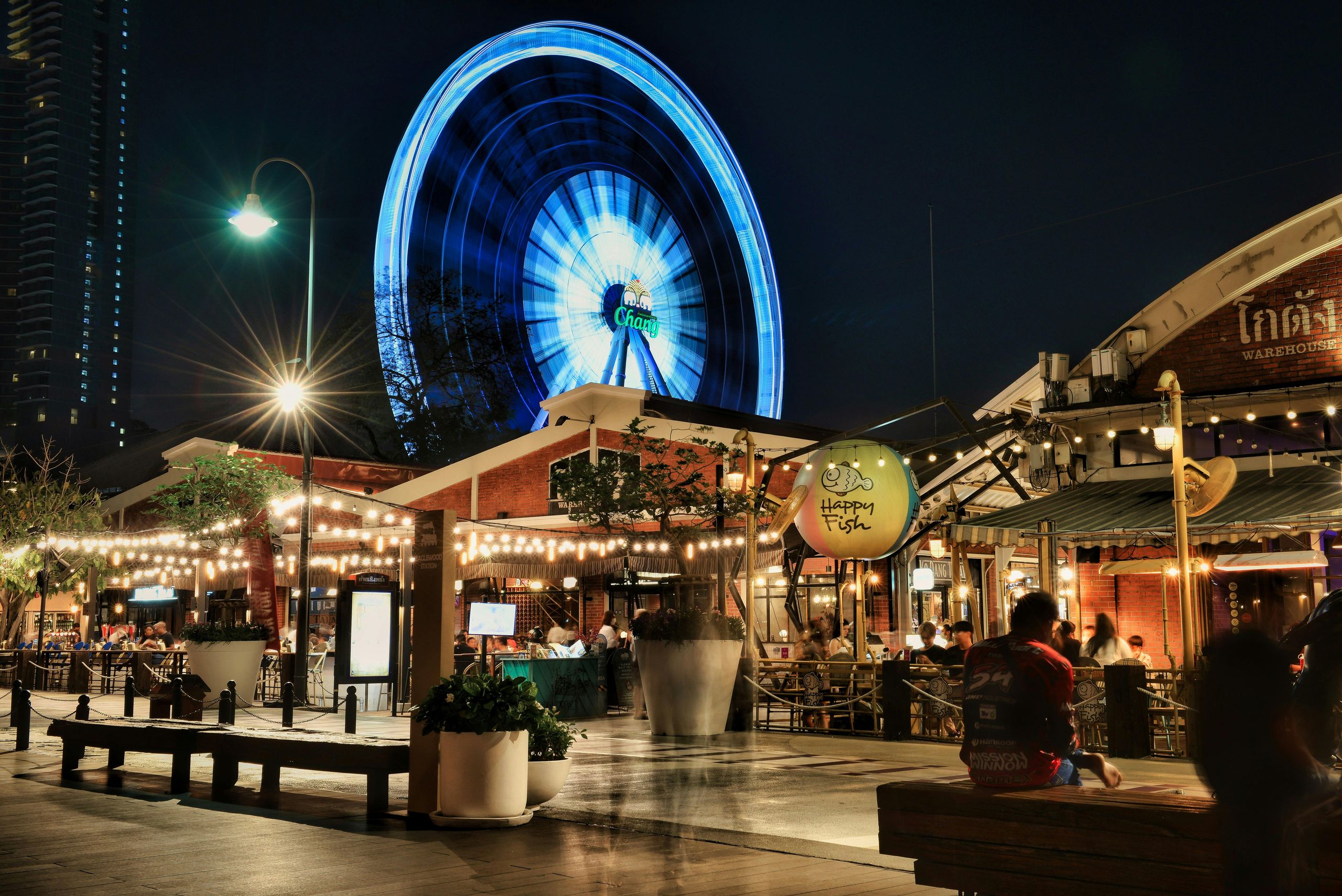 a ferris wheel in the background