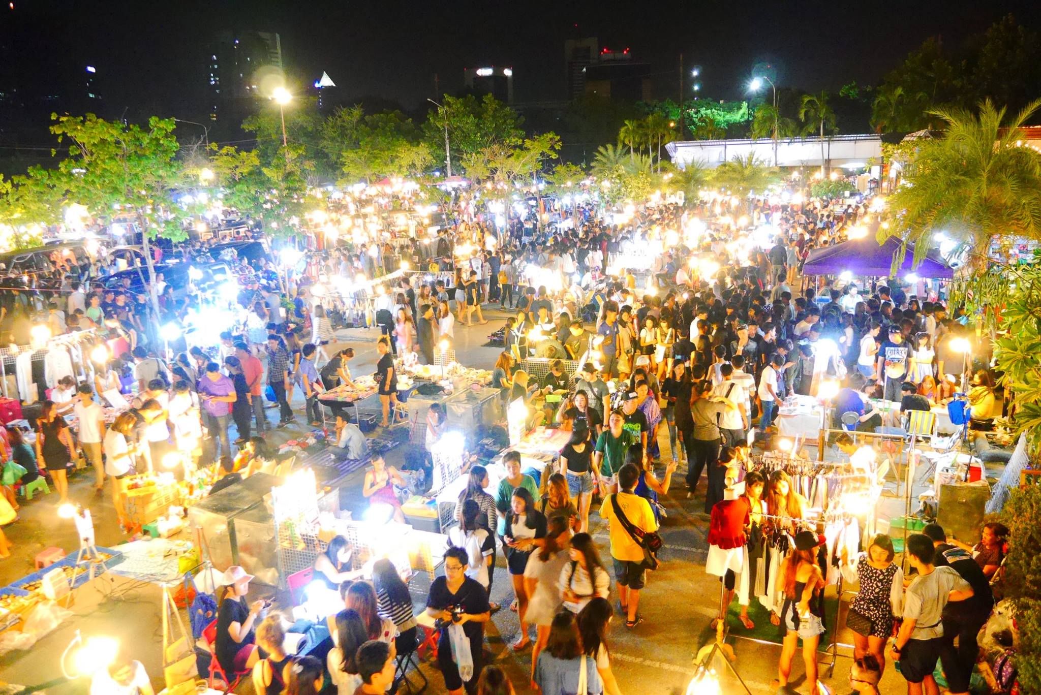 a large crowd of people at a market JJ Green Night Market